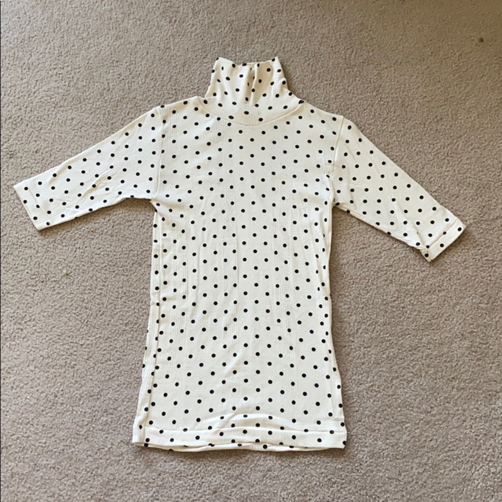 Edith A. Miller Turtle Neck